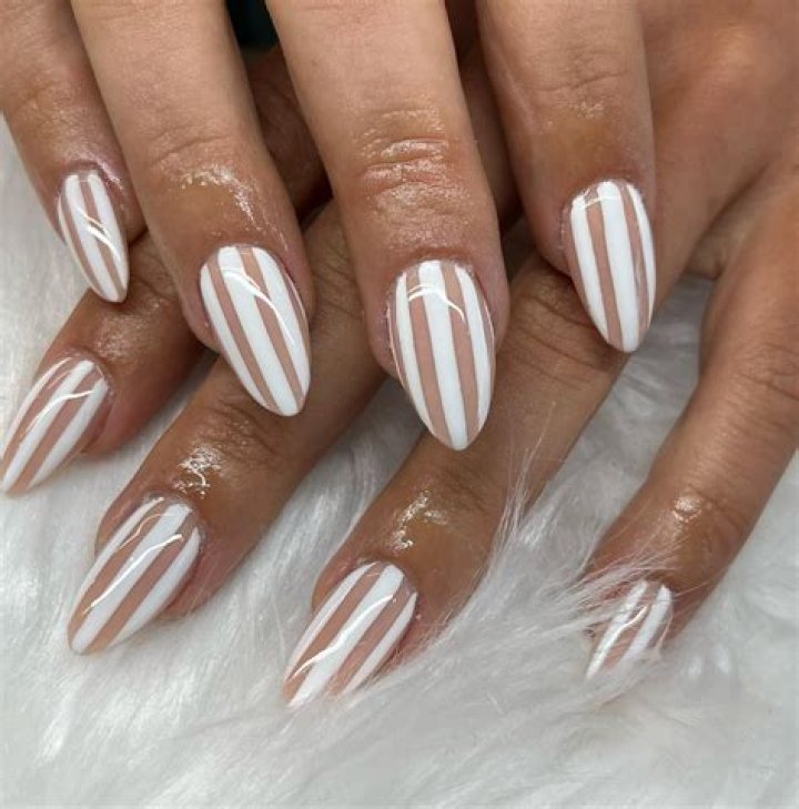 Discover the Meaning Behind: Vertical Stripes on Nails