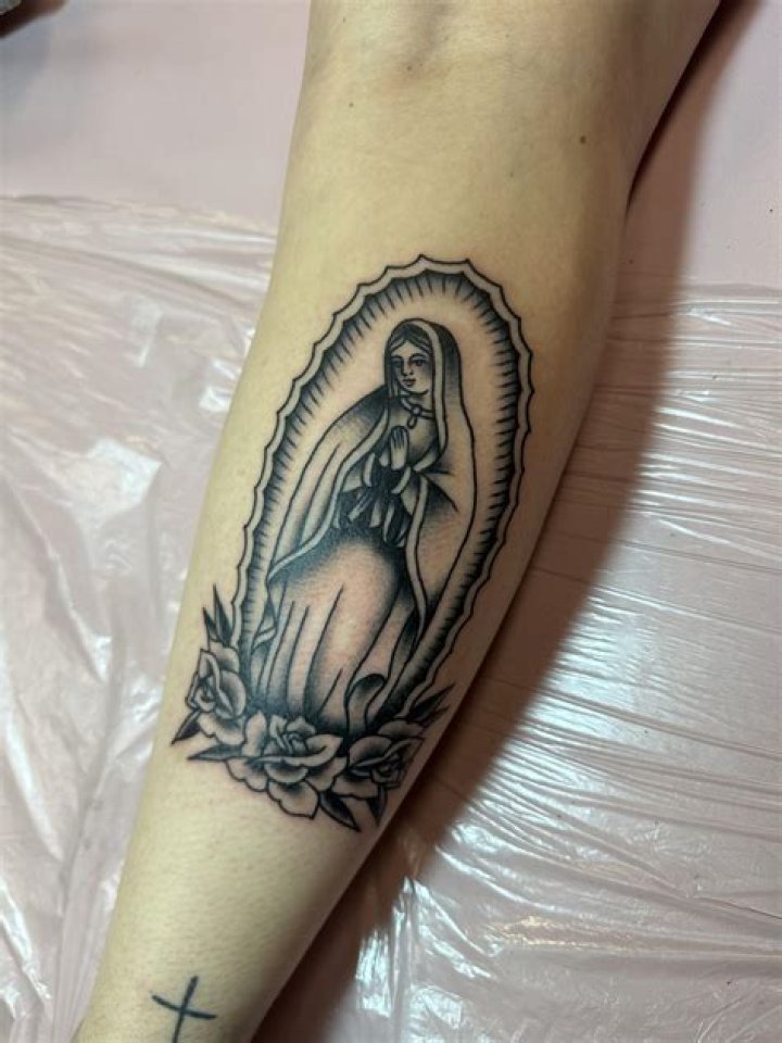 Unveiling the Hidden Meaning: What Does a Santa Maria Tattoo Symbolize?